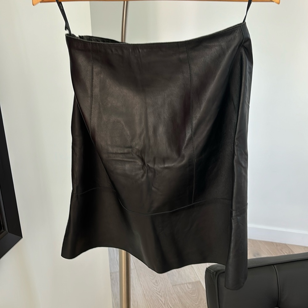 bebe, Leather A-line Skirt with Side Slits.